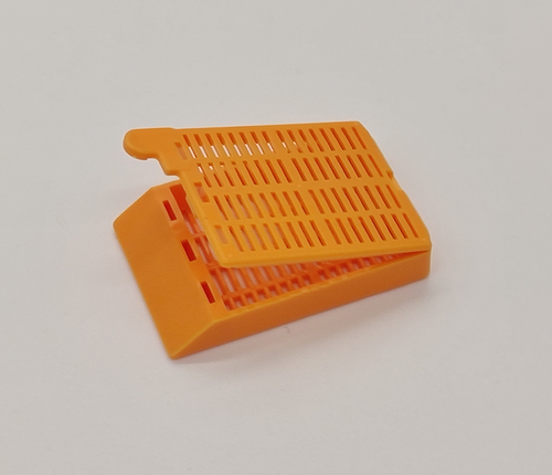 [GEN-GS-1094N] plastic biopsy tissue cassettes with attached lid and 35 angled face orange 